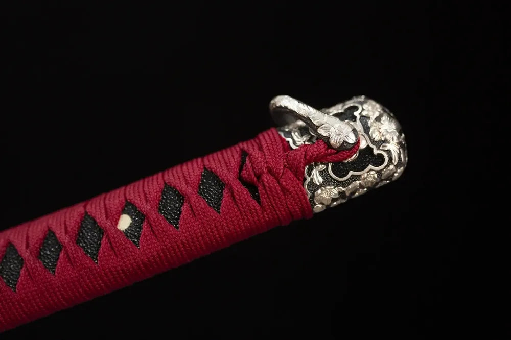 Top plum‑blossom‑sculpted pure‑copper kashira pommel front close‑up
