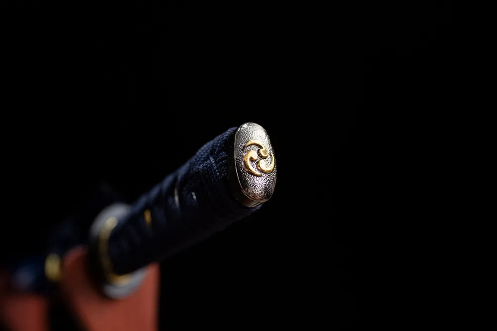 Carved bamboo‑motif antique‑bronze alloy pommel‑cap detail shot