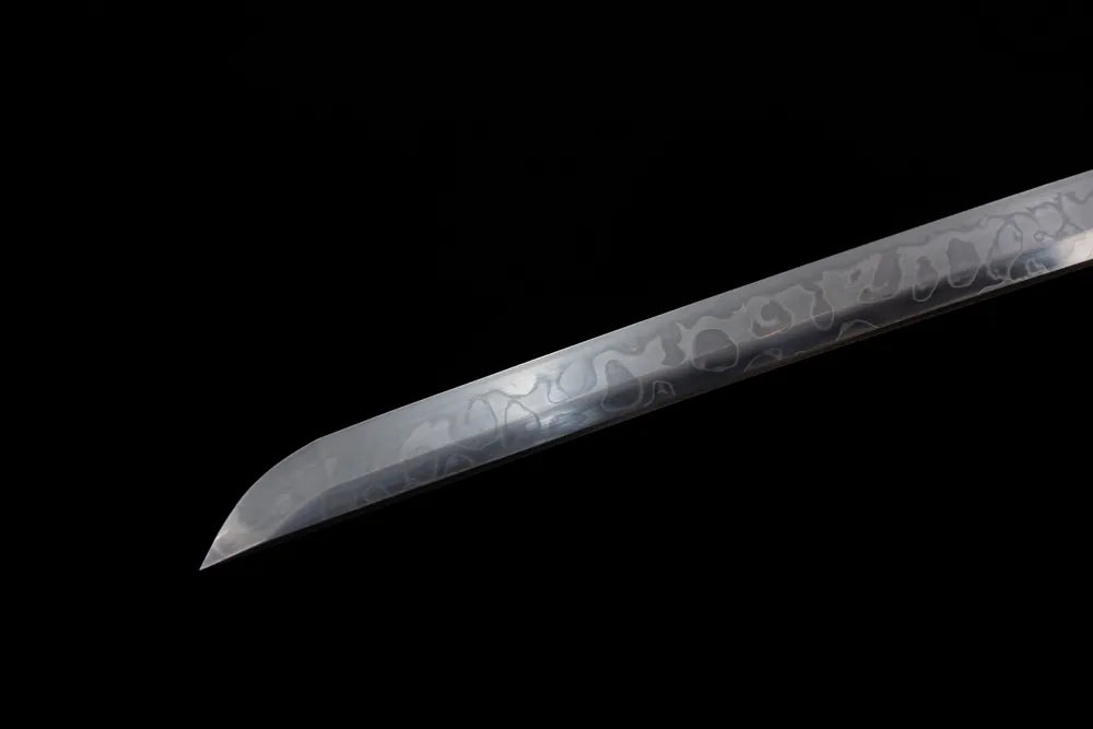 Classic functional katana‑style kissaki tip of Aeolian‑Bells‑Katana blade close‑up view