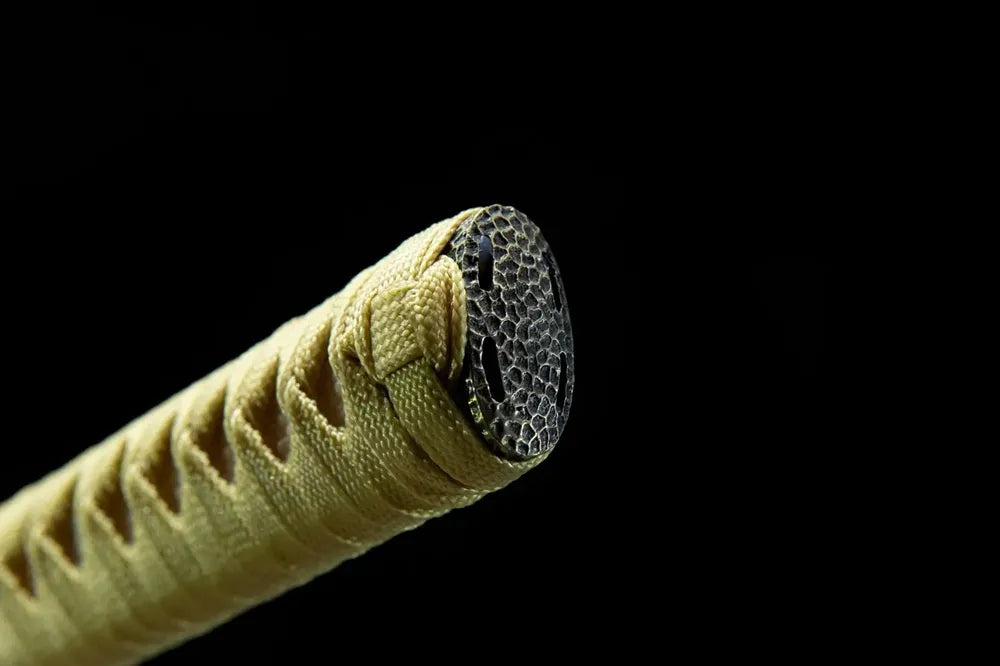 Textured pommel cap detail