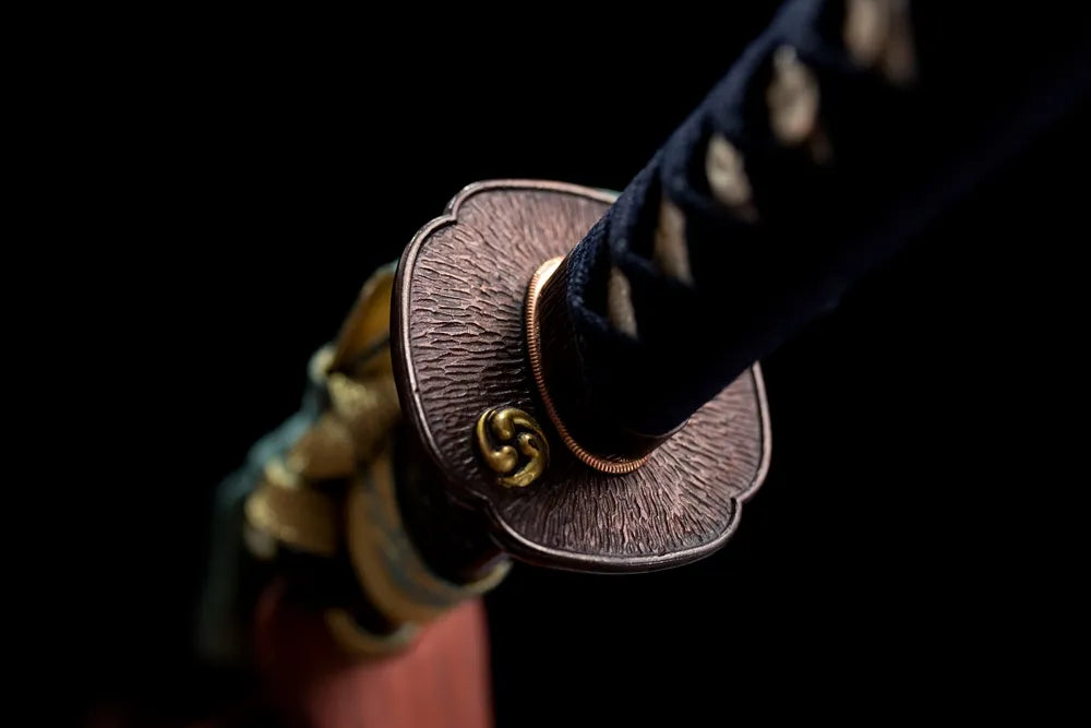 Reverse side star‑nebula engraving brass‑alloy tsuba surface texture close‑up