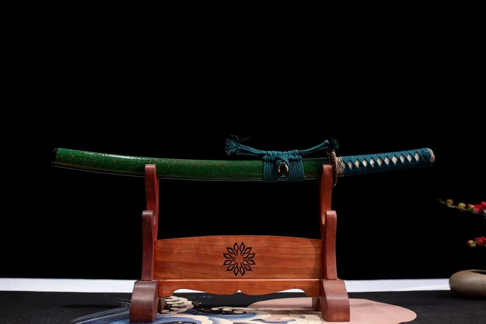 Horizontal laid closed emerald‑gradient Green‑Shade‑Wakizashi scabbard flat table‑top front display