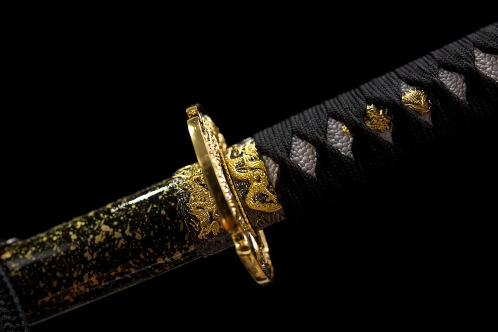 Dragon‑relief gilded‑alloy fuchi grip‑ring macro close‑up