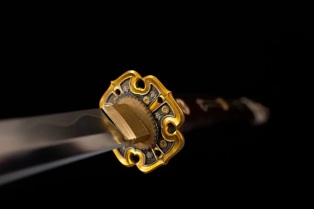 Front open‑work 16‑petal‑royal‑chrysanthemum‑relief gilded‑vintage alloy tachi hand‑guard close‑up