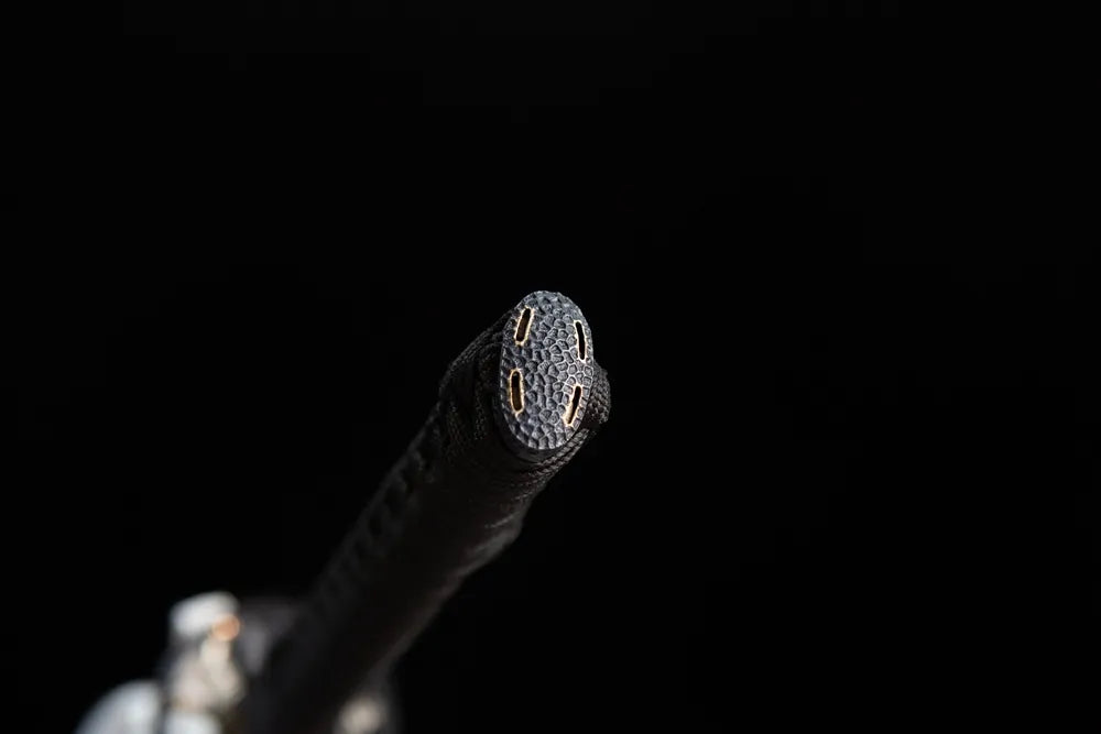 Textured four-hole pommel cap