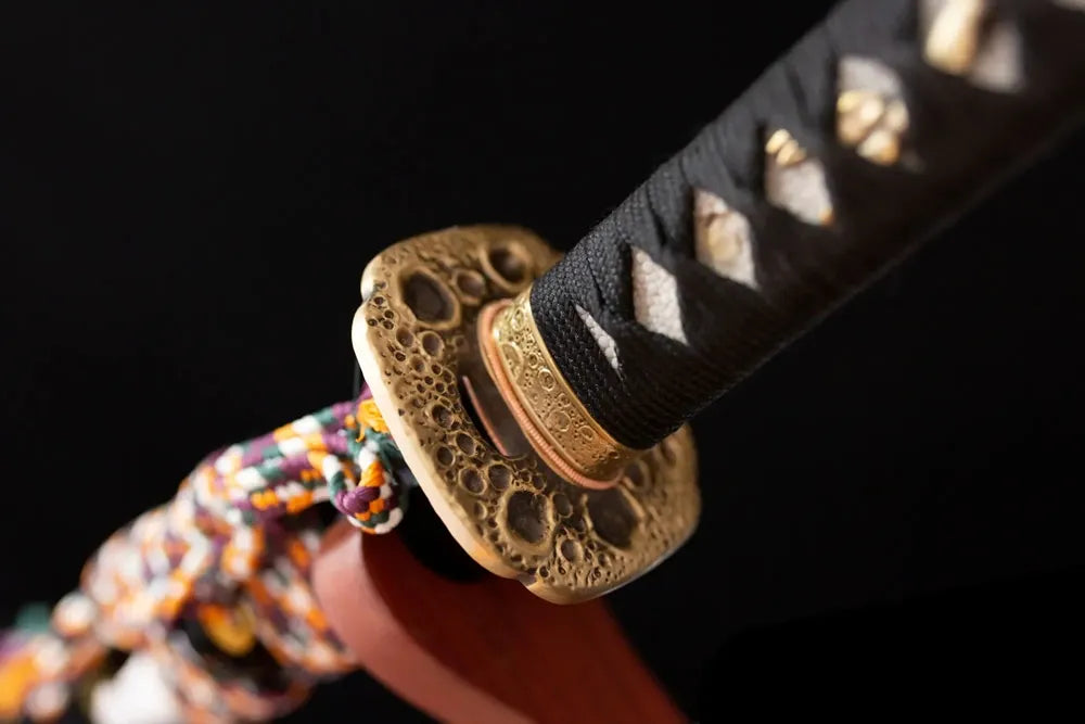 Reverse‑side cosmic‑meteor‑trail carving meteor‑grey tsuba surface texture close‑up