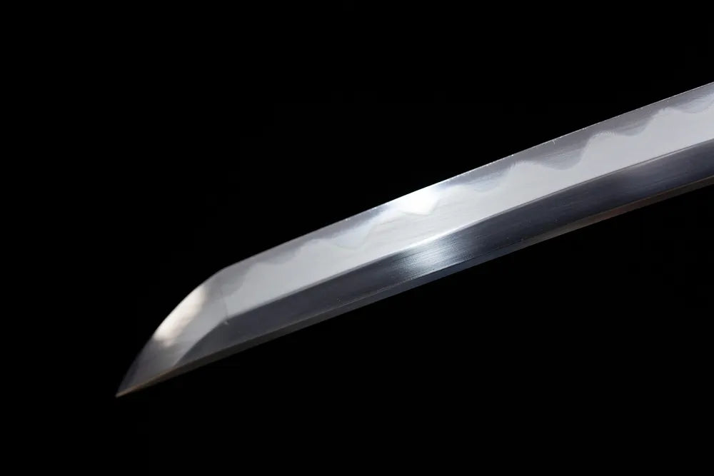 Compact functional wakizashi‑style kissaki tip of Night‑Elf‑Wakizashi blade close‑up view