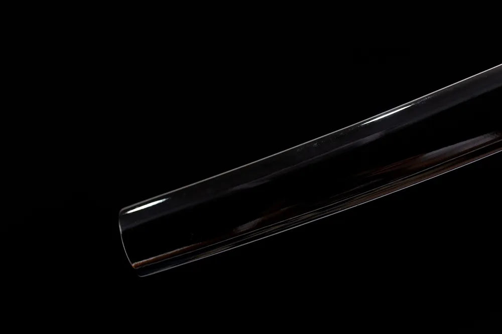 Bottom smooth black mini scabbard end cap close-up