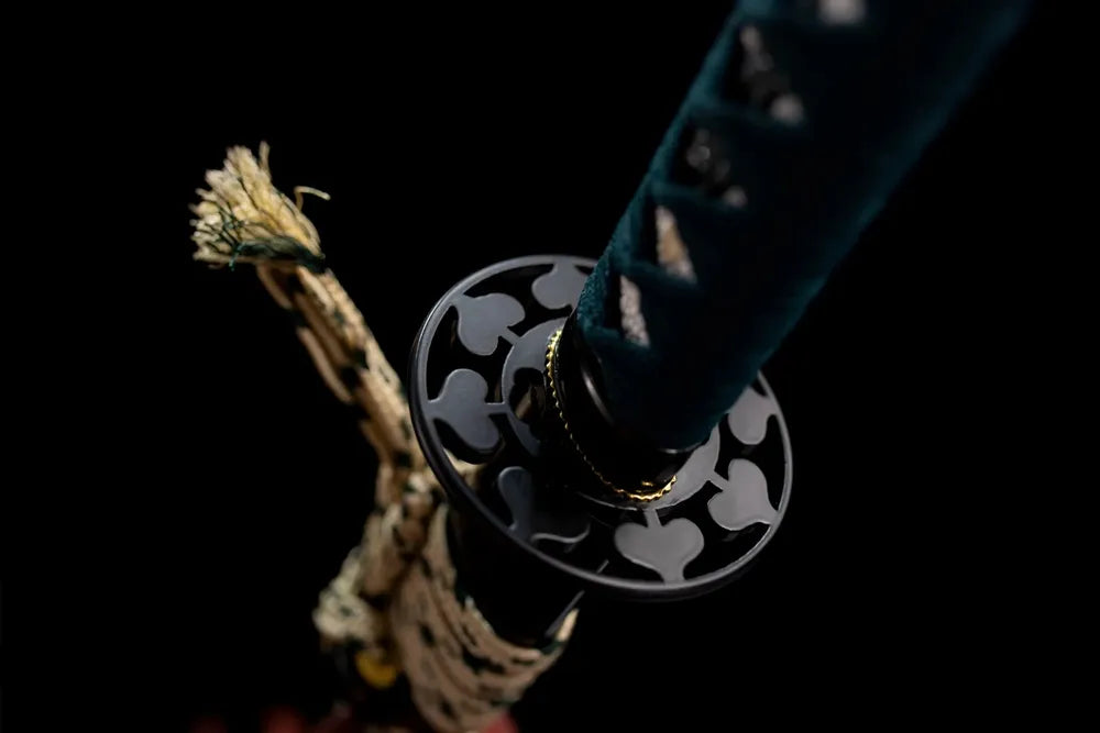 Reverse ginkgo‑leaf engraving brass‑toned alloy tsuba surface texture