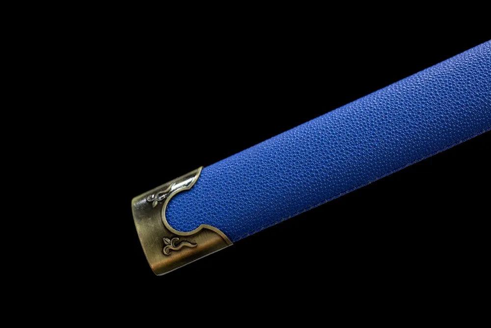 Bottom bronze tail cap blue leather sheath close-up