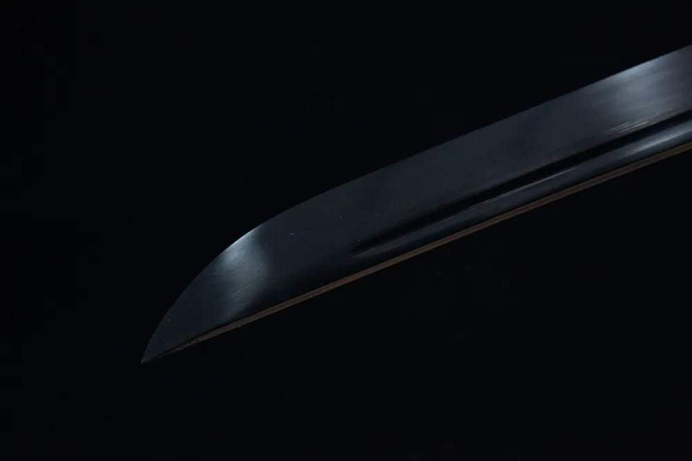 Kissaki tip closeup sharp combat cutting edge matte black finish