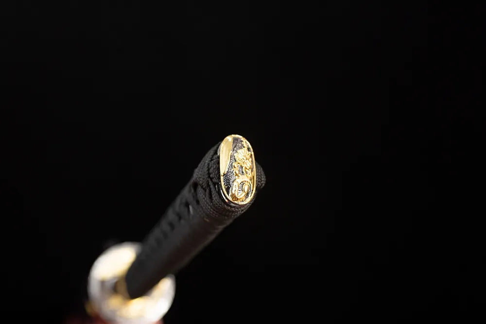3D‑sculpted plum‑blossom‑scroll gilded‑alloy pommel‑cap detail shot‑long katana