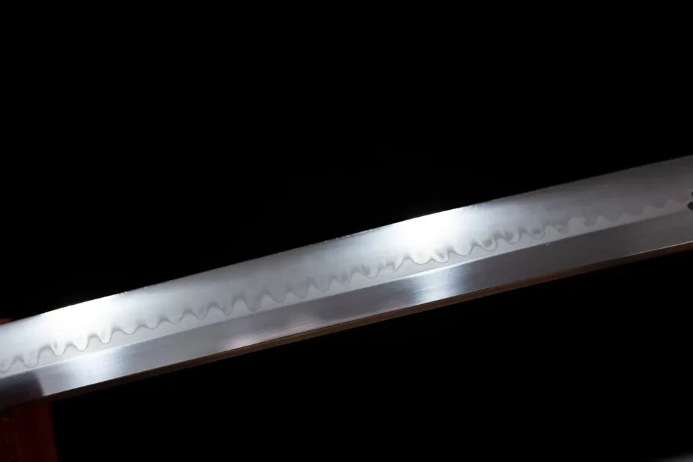 Mid‑section midare‑gunome meteor‑burst‑streaking‑pattern hamon steel katana blade surface close‑up shot