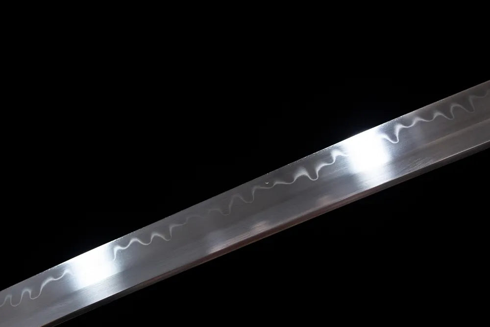 Mid‑section midare‑gunome meteor‑tail‑flame‑ripping‑pattern hamon steel katana blade surface close‑up shot