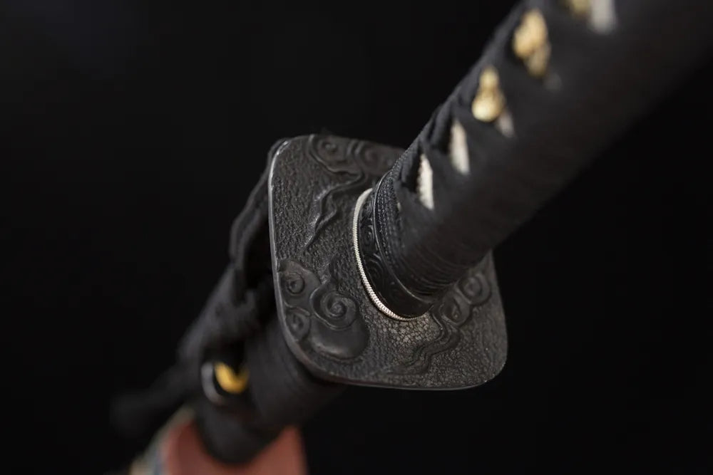 Reverse‑side surging‑ocean‑cloud‑wave carving vintage‑black‑cloud‑alloy tsuba surface texture close‑up