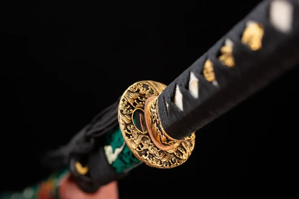 Reverse‑side imperial‑coiled‑dragon‑scroll carving gilded‑alloy tsuba surface texture close‑up