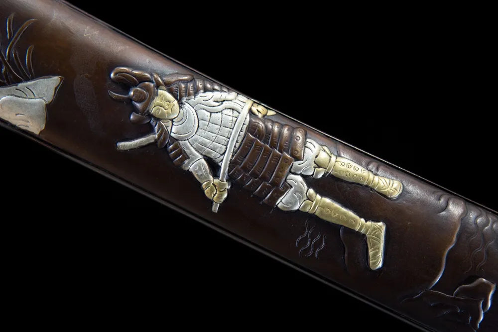 Carving on the middle section of the reverse scabbard