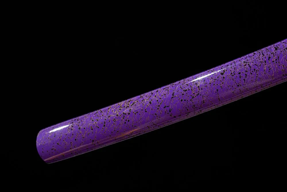 Bottom violet‑purple saya vintage‑brass kojiri end‑cap close‑up