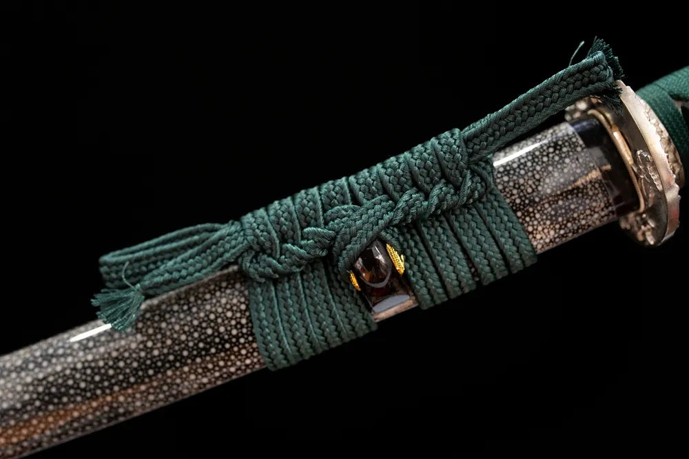 Thick blush‑pink mixed‑braided sageo cord pink‑gild fitting macro close‑up