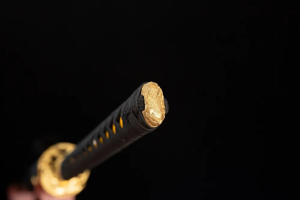 3D‑sculpted raven‑silhouette aged‑bronze pommel‑cap detail shot