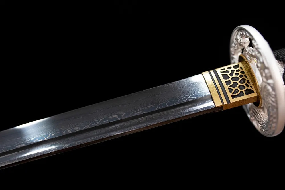 Upper T10 clay‑tempered katana blade brass habaki midare‑gunome butterfly‑scale‑powdery fragmented‑surge hamon temper‑line macro close‑up