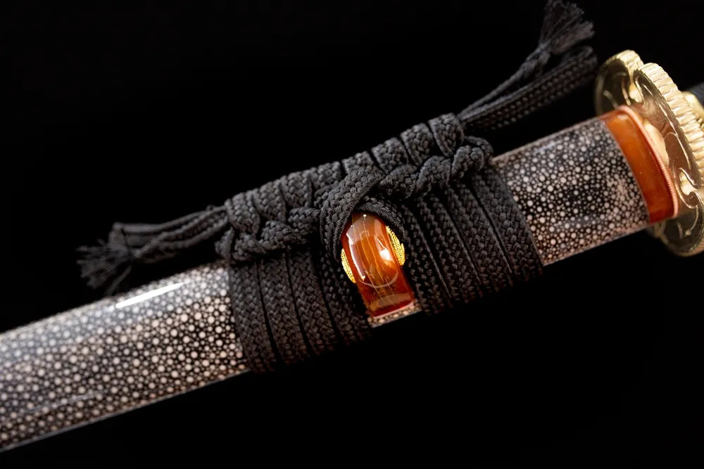 Thick midnight‑violet mixed‑braided sageo cord dark‑iridescent‑silver fitting macro close‑up