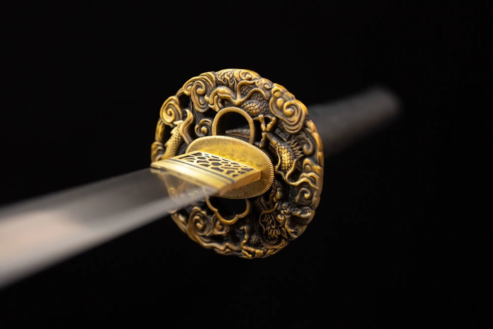 Front open‑work lurking‑dragon‑cloud‑silhouette‑relief antique‑gilt‑bronze katana hand‑guard close‑up