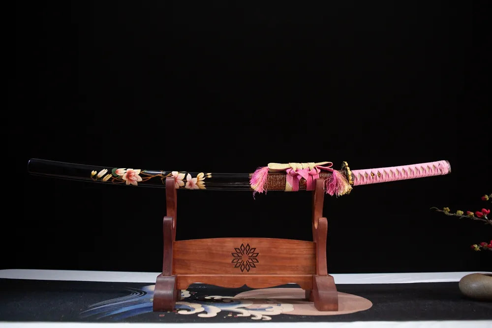 Horizontal laid closed black lacquer peach flower samurai sword