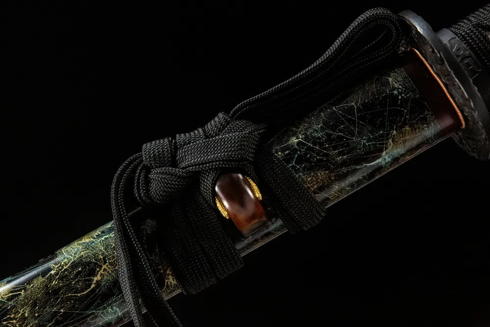 Black coarse cotton sageo cord tied on ox horn saya ring
