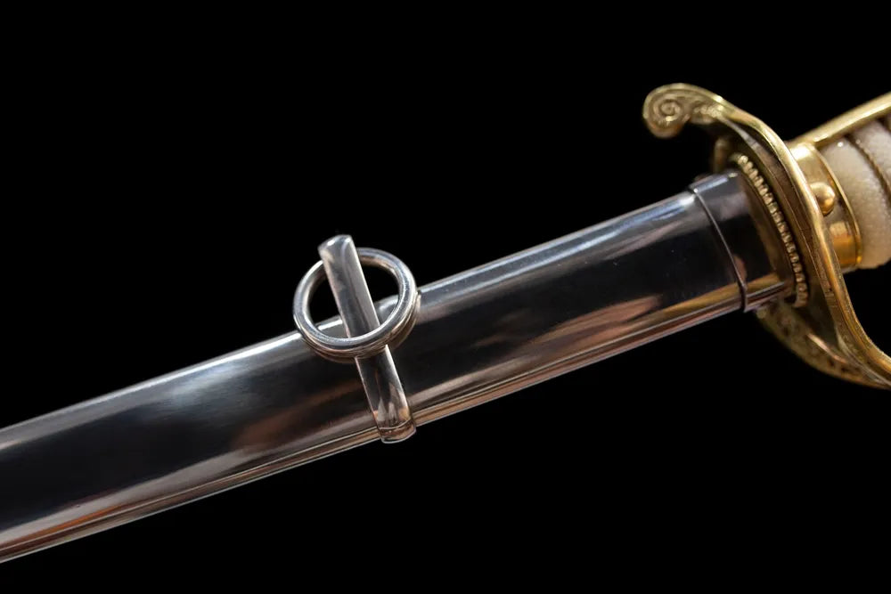 Mid‑section high‑gloss mirror‑polished metal scabbard hanging‑ring fitting texture close‑up