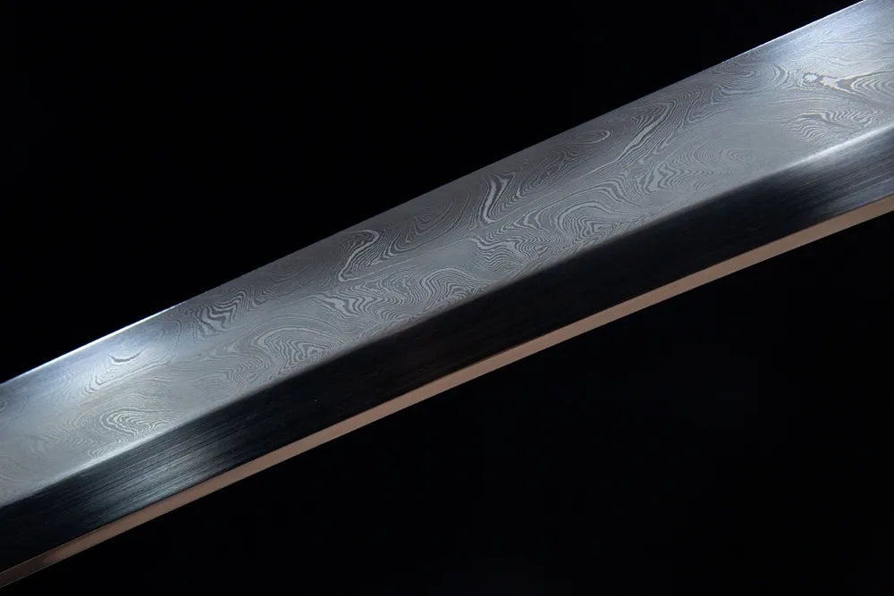 Middle blade detail continuous swirling folded damascus steel polished texture