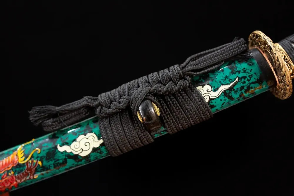 Thick black heavy‑braided sageo cord gilded‑alloy fitting macro close‑up