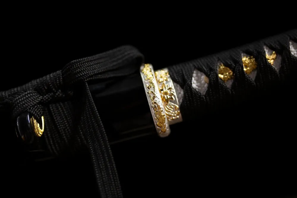 Ornate floral‑gilded‑carved alloy pommel‑cap detail shot