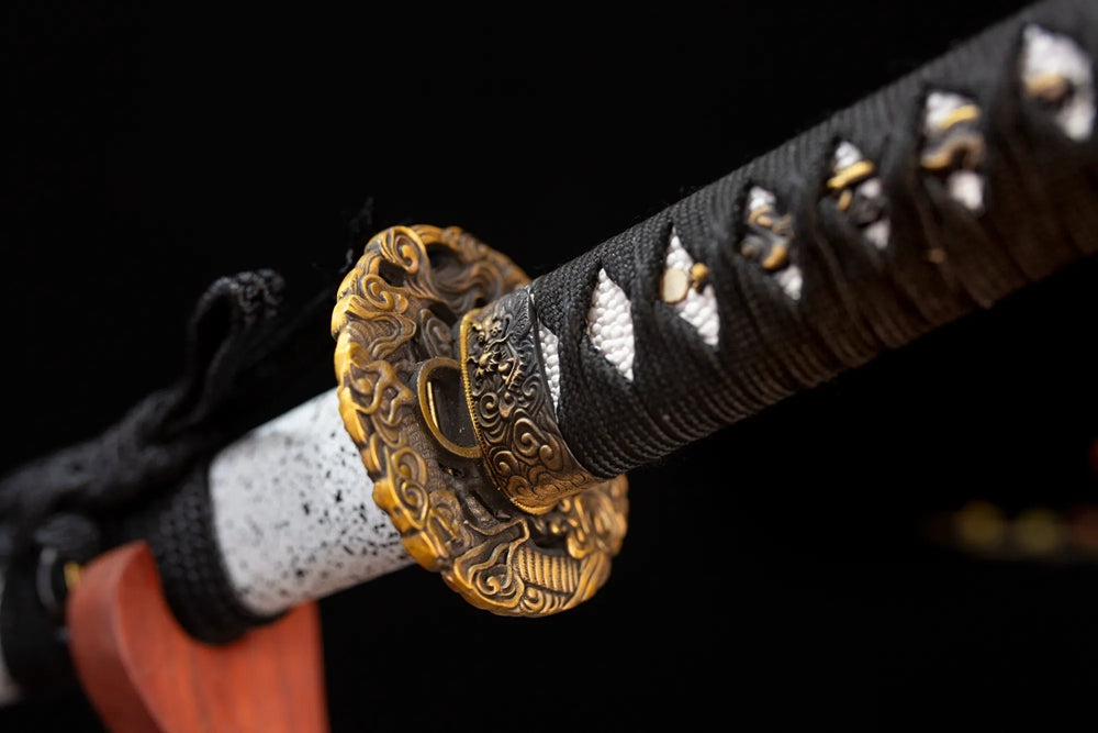 Reverse‑side shadow‑dragon‑cloud‑scroll carving antique‑gilt‑bronze tsuba surface texture close‑up