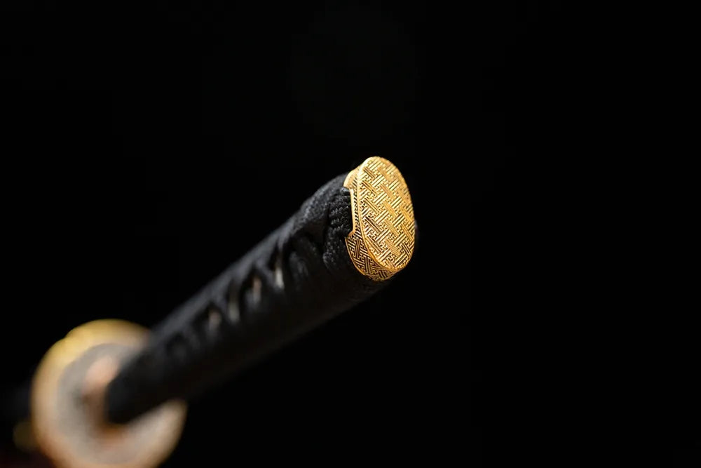 Ornate floral‑motif copper gilded‑silver pommel‑cap detail shot