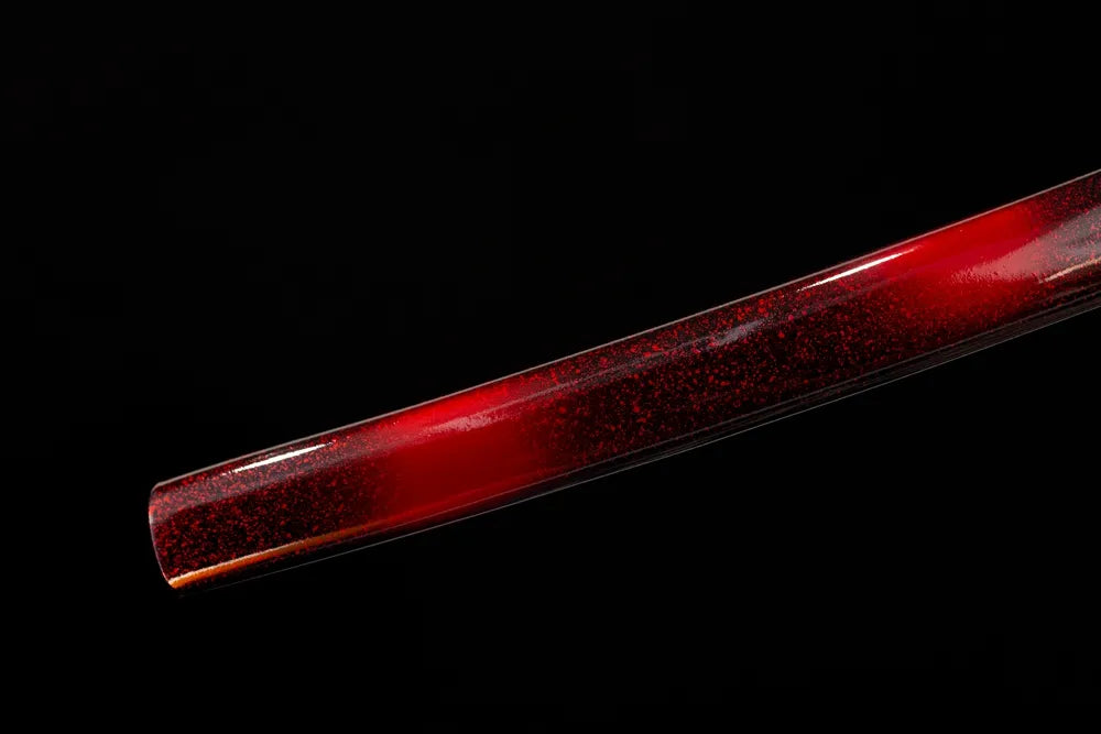 Bottom wine‑red‑gradient saya gold‑silver‑plated copper kojiri end‑cap close‑up