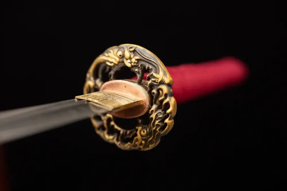Front open‑work hannya‑oni‑demon‑relief antique‑copper katana hand‑guard close‑up