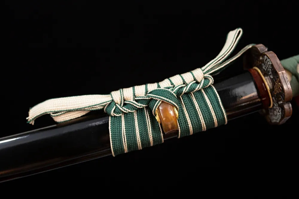 Thick light‑cyan mixed‑braided sageo cord aged‑copper fitting macro close‑up