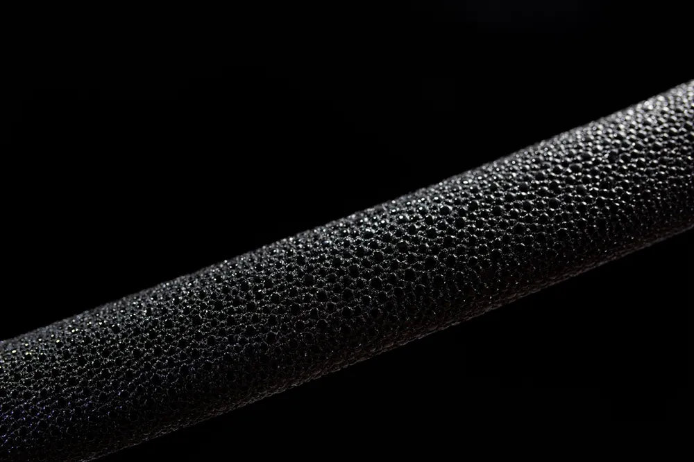 Mid black textured ray skin wrapped solid wood sheath texture