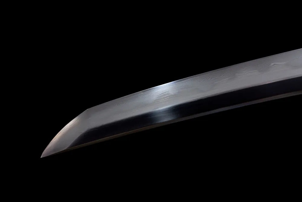 Compact functional wakizashi‑style kissaki tip of Tsurumaru‑Wakizashi blade close‑up view
