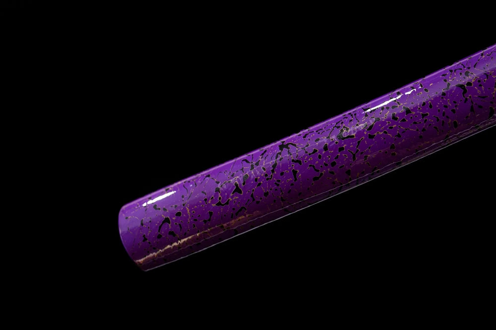 Bottom violet‑halo pearlescent maki‑e saya purple‑toned purple‑gild kojiri end‑cap close‑up