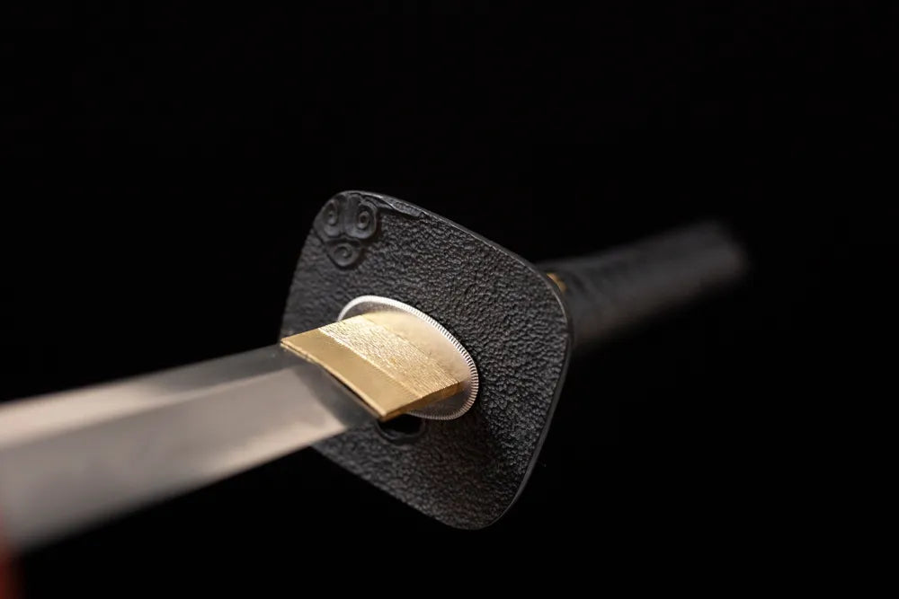 Front open‑work cloud‑ocean‑wave‑relief vintage‑black‑cloud‑alloy katana hand‑guard close‑up