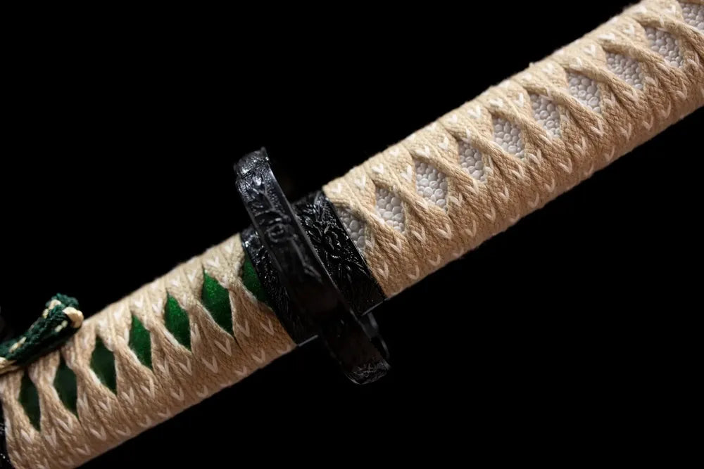 Sakura‑river‑motif carved zinc‑alloy fuchi grip‑ring macro close‑up