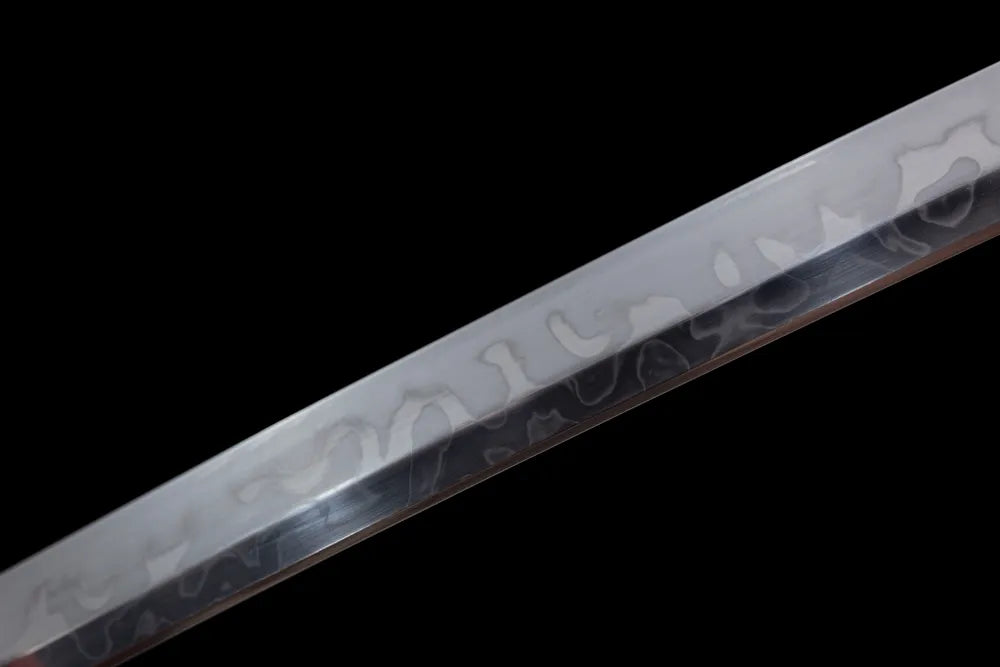 Mid‑section cosmic‑nebula decorative etched steel blade surface close‑up shot