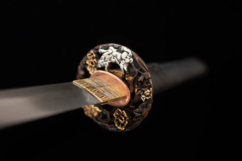Front open‑work floral‑beast‑relief gold‑silver‑plated copper katana hand‑guard close‑up