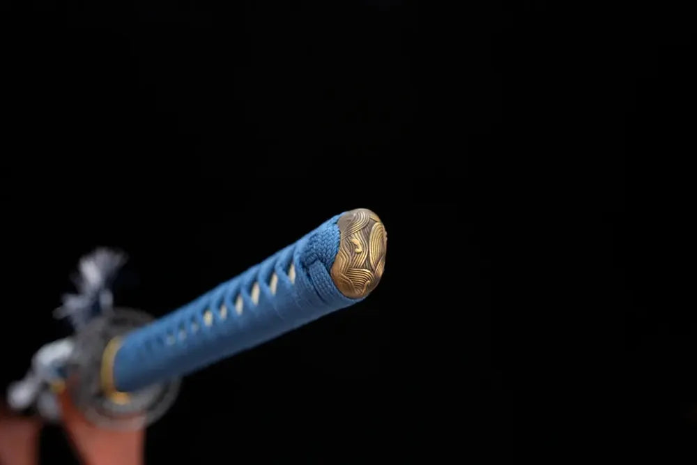 3D‑sculpted flying‑butterfly‑wing‑vein brass pommel‑cap detail shot