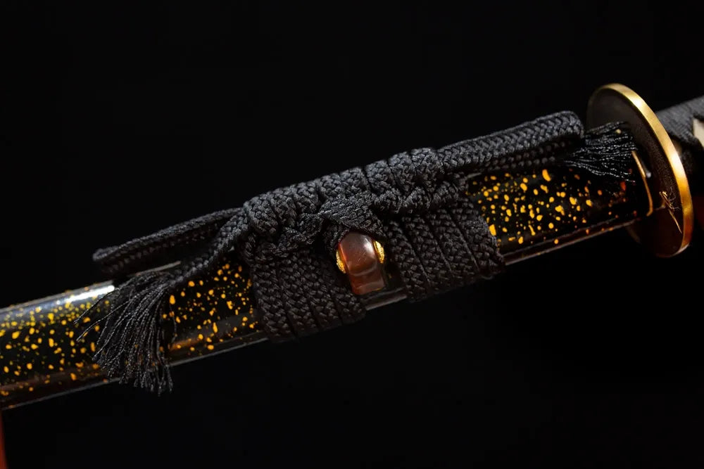 Thick black mixed‑braided sageo cord copper‑brass fitting macro close‑up
