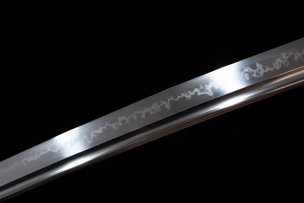 Mid‑section splash‑pattern splashing‑surf‑ripple‑pattern hamon steel wakizashi blade surface close‑up shot‑short wakizashi