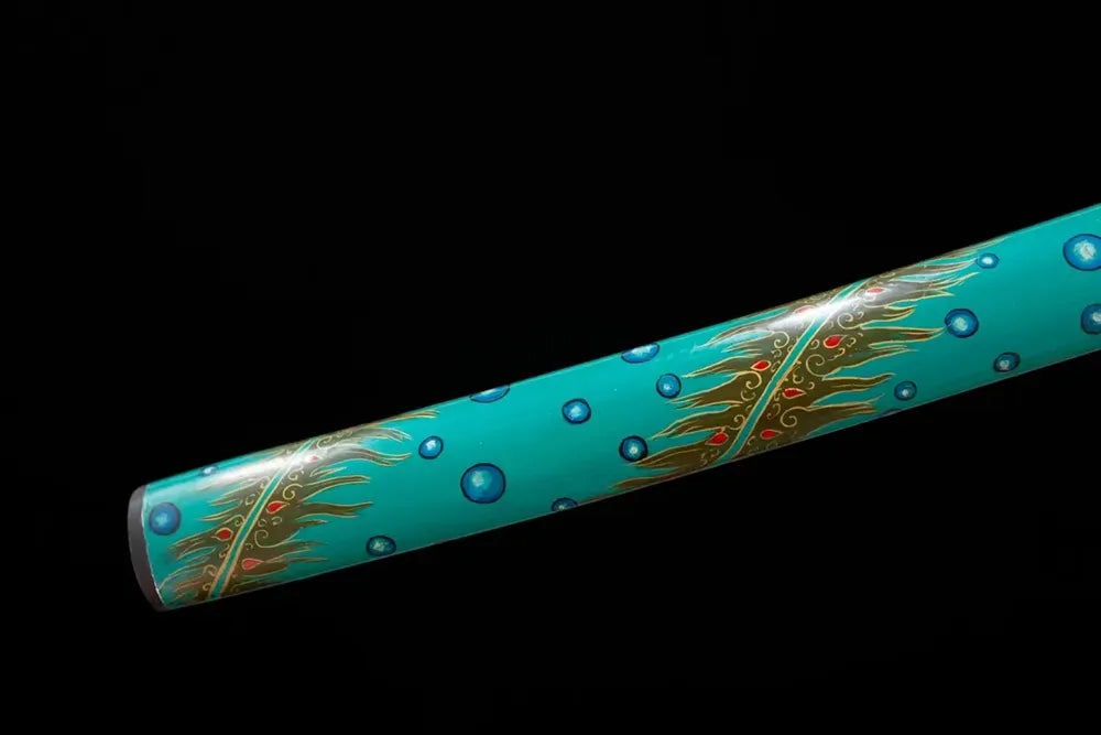 Bottom turquoise‑blue saya gold‑silver‑plated copper kojiri end‑cap close‑up