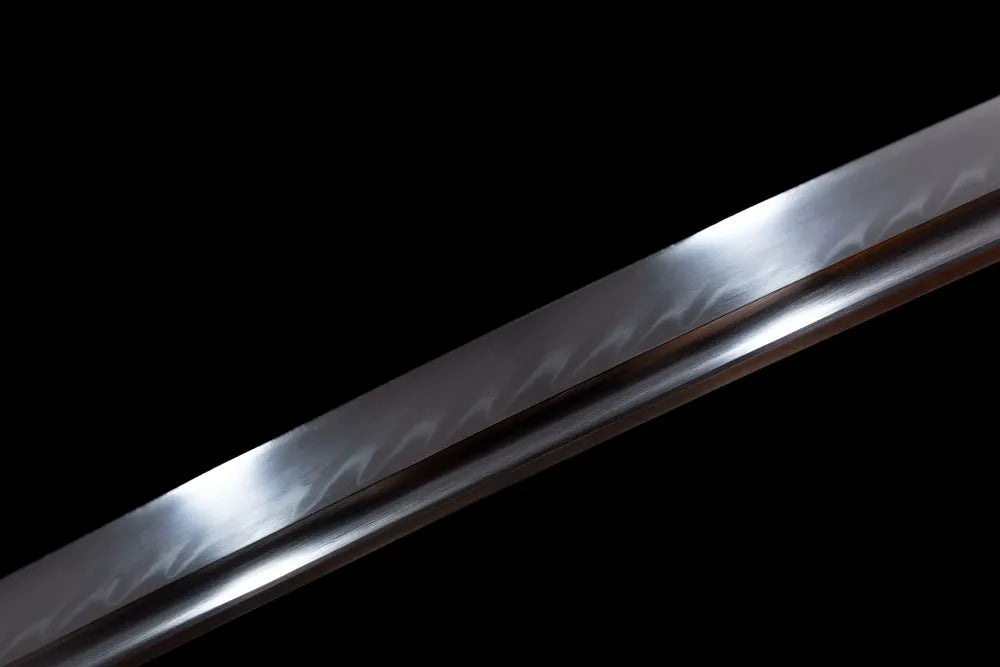 Mid‑section plain polished traditional steel blade surface texture shot